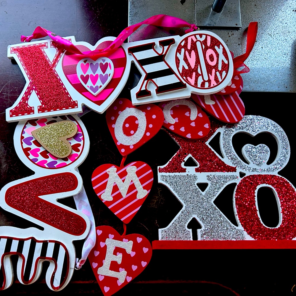 Four different wooden Valentines Day Decor hanging and tabletop, pink glitter